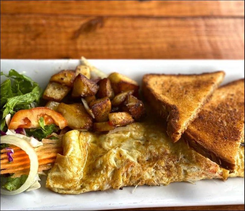 Omelette with potatoes and toast
