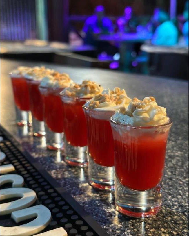 Signature shots on the bar at Traditions Poolside