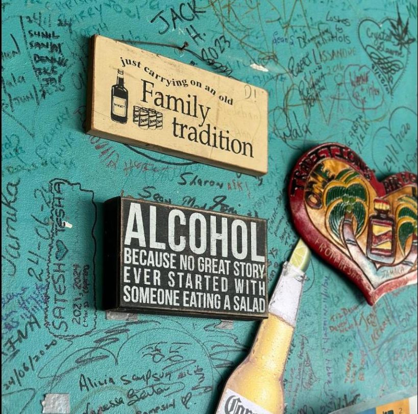 Signed wall at Traditions with 'Family tradition' sign