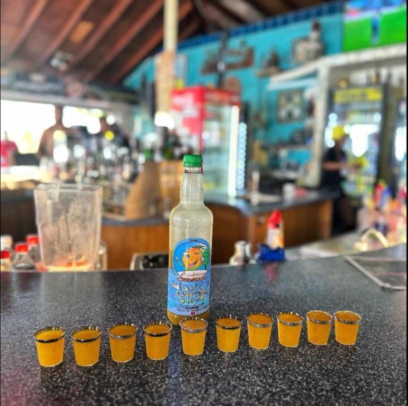 Mango chow shots lined up on the bar