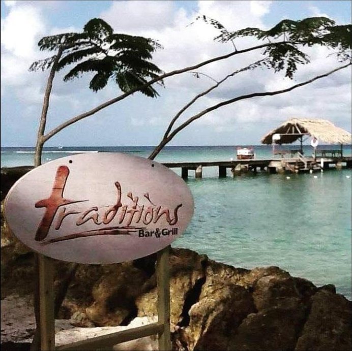 Traditions sign at Pigeon Point jetty, Tobago